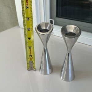 2 Nambe silver candle holder.